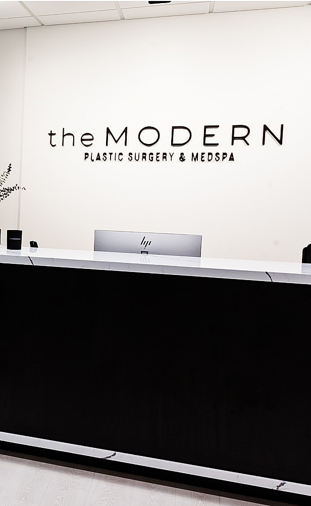 Modern plastic surgery and medspa reception area.
