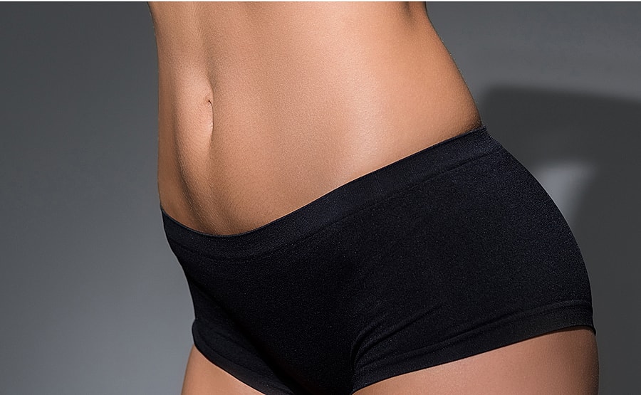 Close-up of abdomen in black underwear.