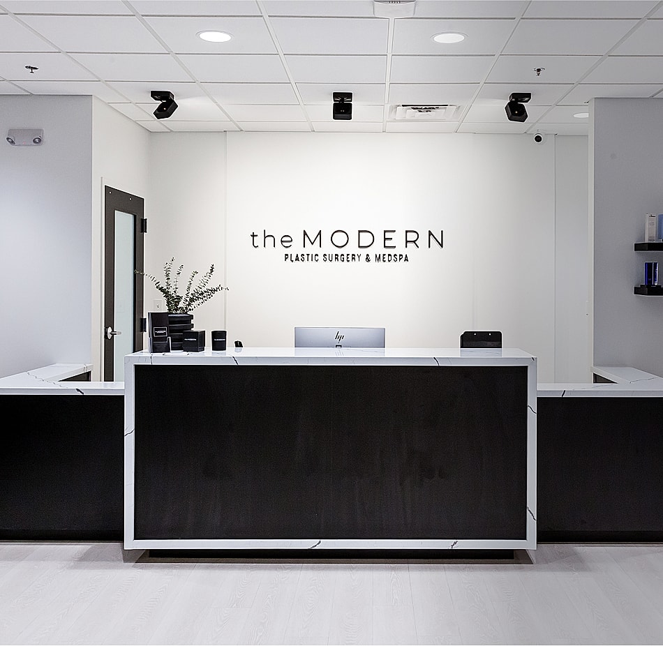 Modern plastic surgery and medspa reception area.
