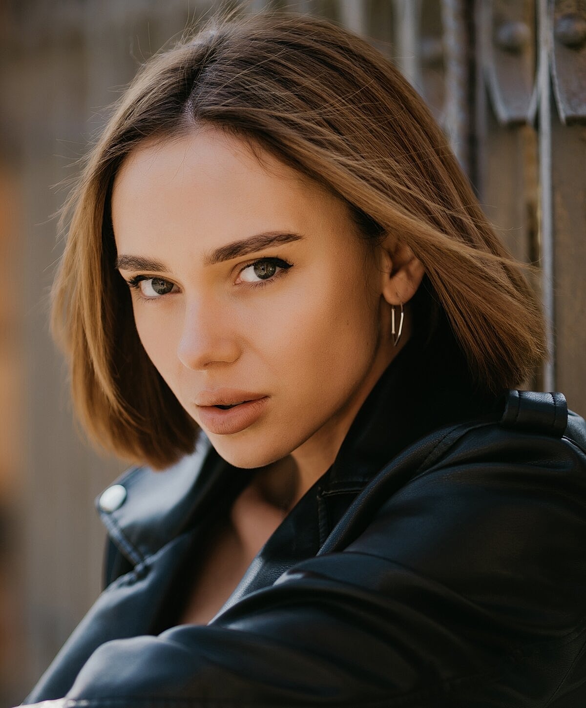 Portrait of a woman in a black outfit.