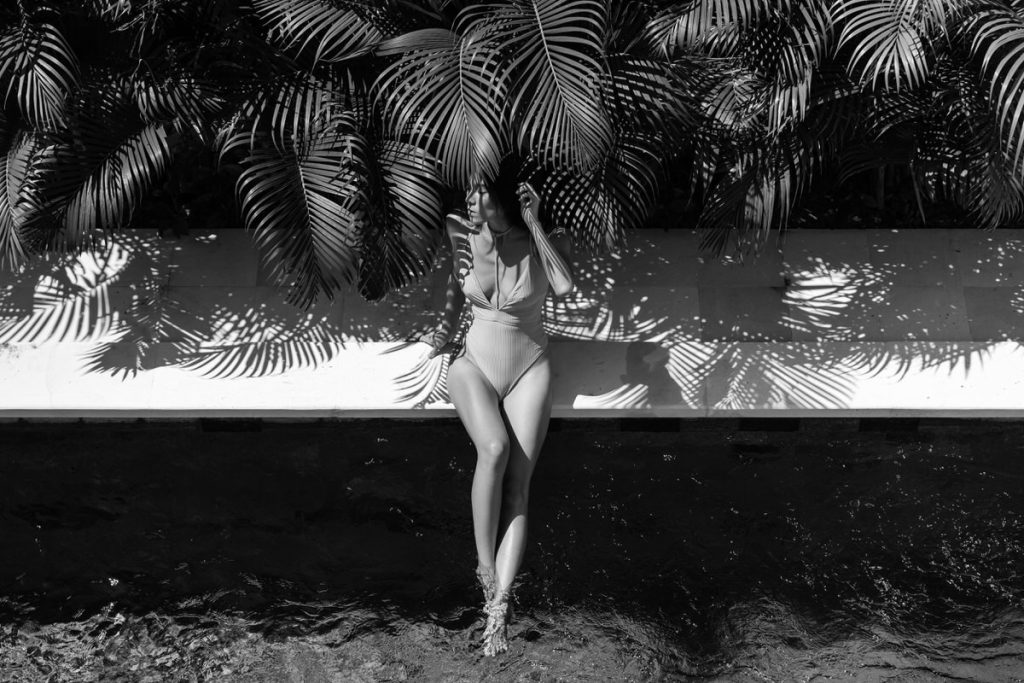 woman relaxing at spa pool.